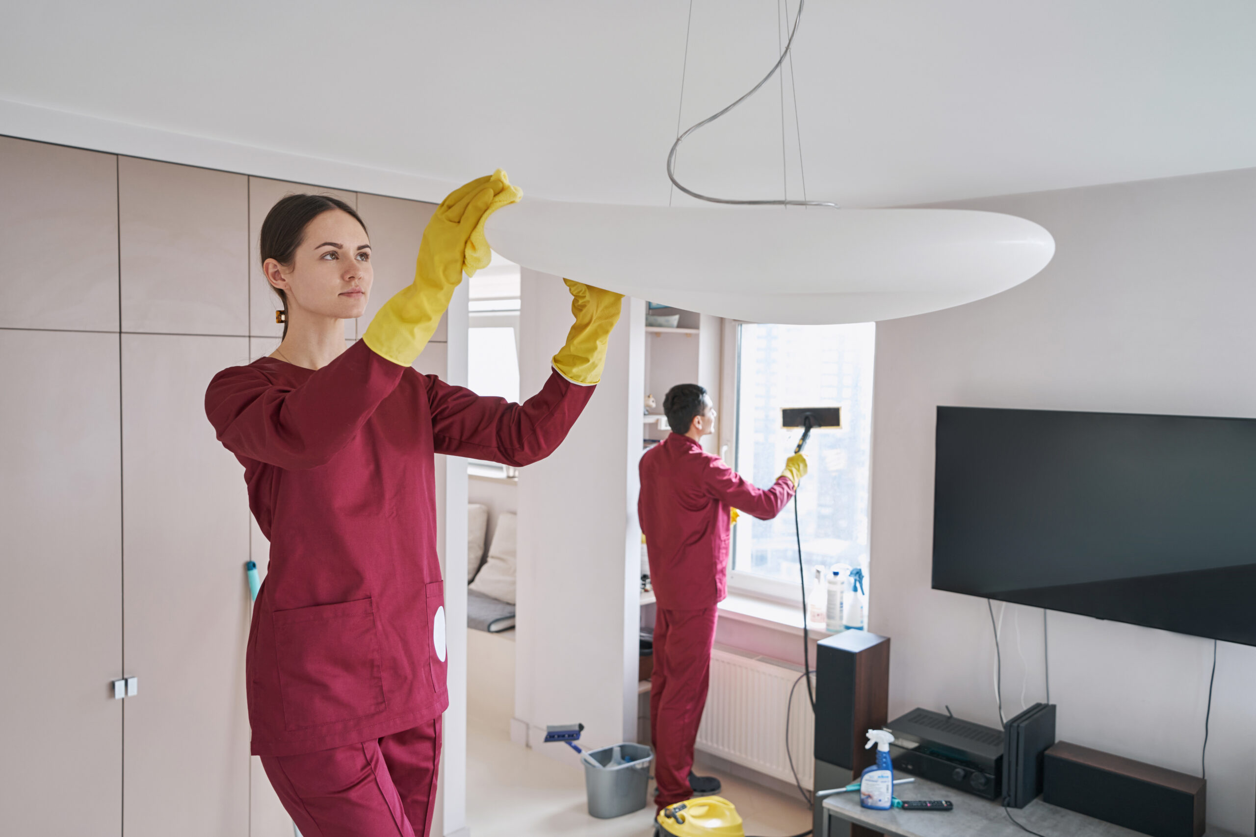 Professional residential cleaning team working inside a Dubai home