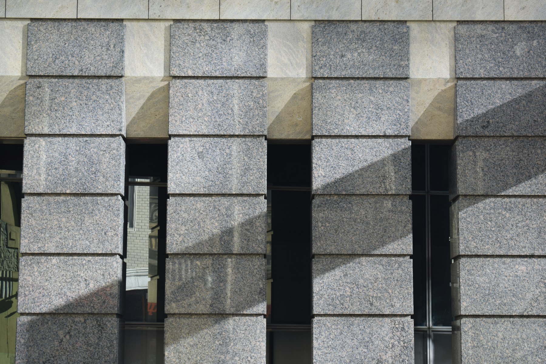 Stone and glass facade materials